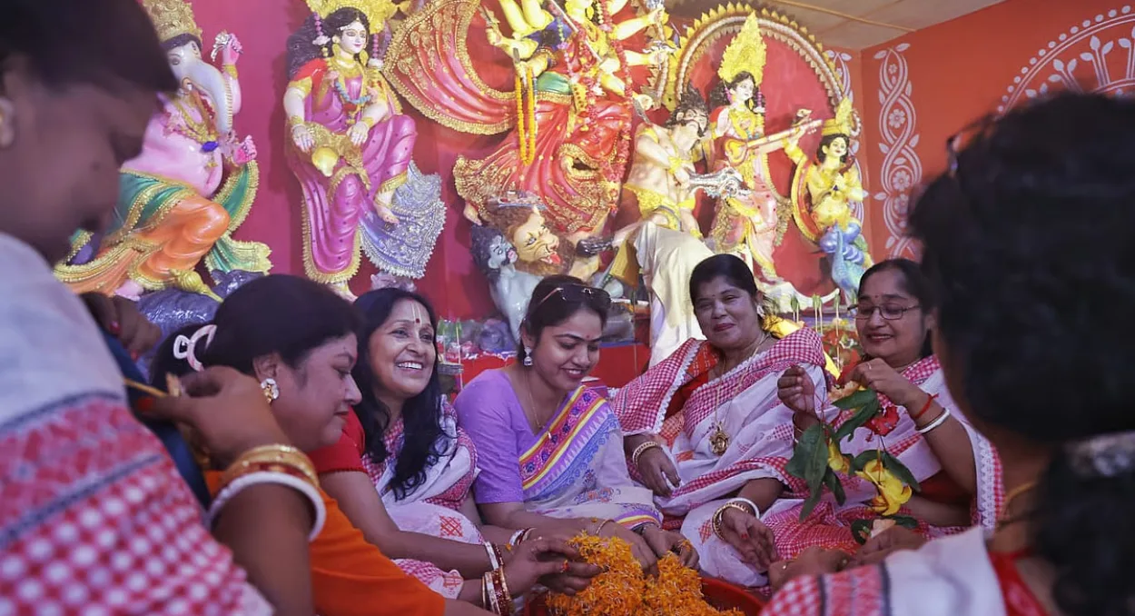 Devotees gather at Ramna Kali Mandir to celebrate Maha Saptami