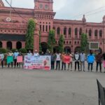Human chain of banned Chhatra League and Jubo League in front of DC office in Chittagong.