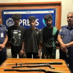 They were preparing to rob by sitting behind a tree, they had guns and guns in their hands