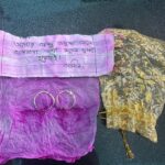 A gold pendant in the donation box for mother’s recovery, along with an emotional note