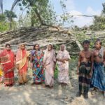 Residents tearful in front of the banyan tree which commemorates the poet Madhusudan