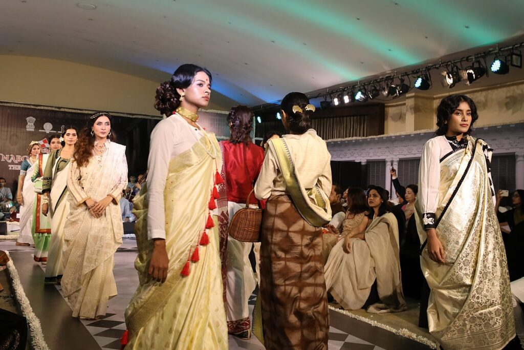 The women of Thakurbari came up on the stage