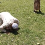 Returning to the school after 21 months, the head teacher sat in prostration on the field