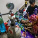 Two sons with measles are in two hospitals, distraught father