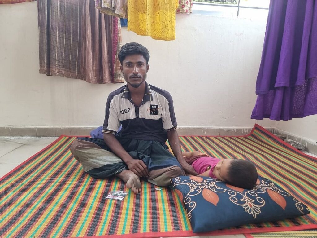 Son in ICU, father waiting on floor to admit daughter
