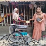 UN official visits childs home to deliver wheelchair and financial aid
