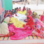 Rajshahi women trade farm labor for embroidery to fund community schools