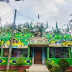 Bangladesh schoolteacher transforms home into vibrant Brazil football tribute