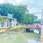 Encroachment turns Comilla vital drainage artery into narrow drain triggering chronic flooding
