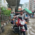 Heavy Rains Paralyze Dhaka Traffic as Commuters Struggle with Flooded Streets