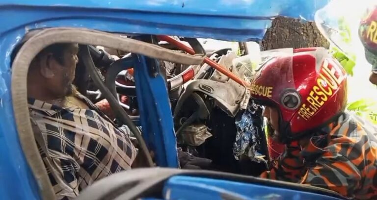 Driver rescued after covered van crashes into trees on Dhaka-Chattogram highway