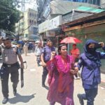 Businesswoman assaulted by mob while being escorted by police in Rajbari