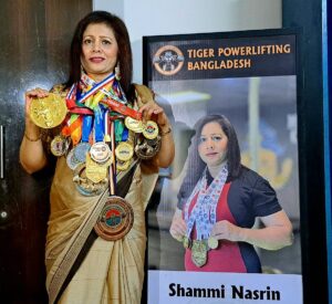 Fifty-four-year-old Bangladeshi housewife rises to international powerlifting success