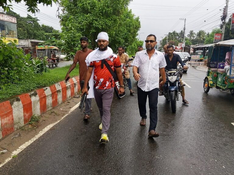 Former student leader sparks public panic in Ishwardi after brandishing firearm while wearing burial shroud