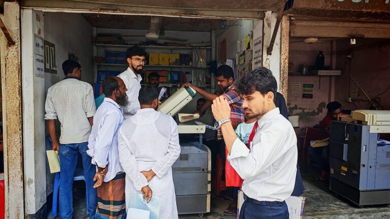 Hearing-impaired brothers find success running thriving print shop at Joypurhat courthouse